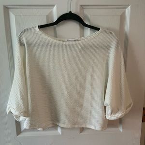 “Caution to the Wind” crop top.